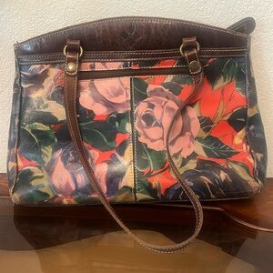 A nearly new leather Patricia Nash designer satchel